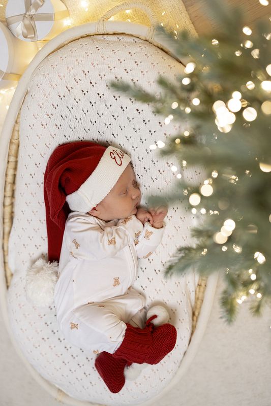 Julebooties med hvite pompom dusker